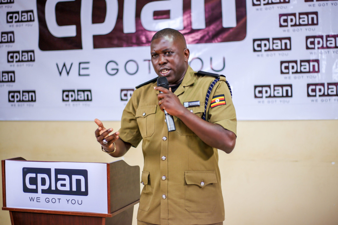 SP Ruganzu talking to CPlan contractors about security in the cyber world at the Contractors' training